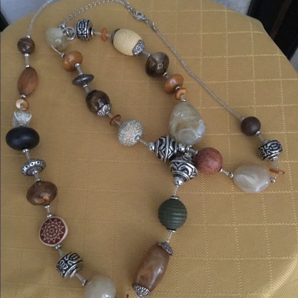 Erica Lyons Stone, wood, and metal necklace.